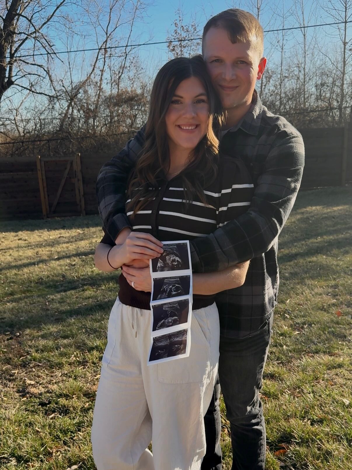 Tyler & his wife with ultrasound photos
